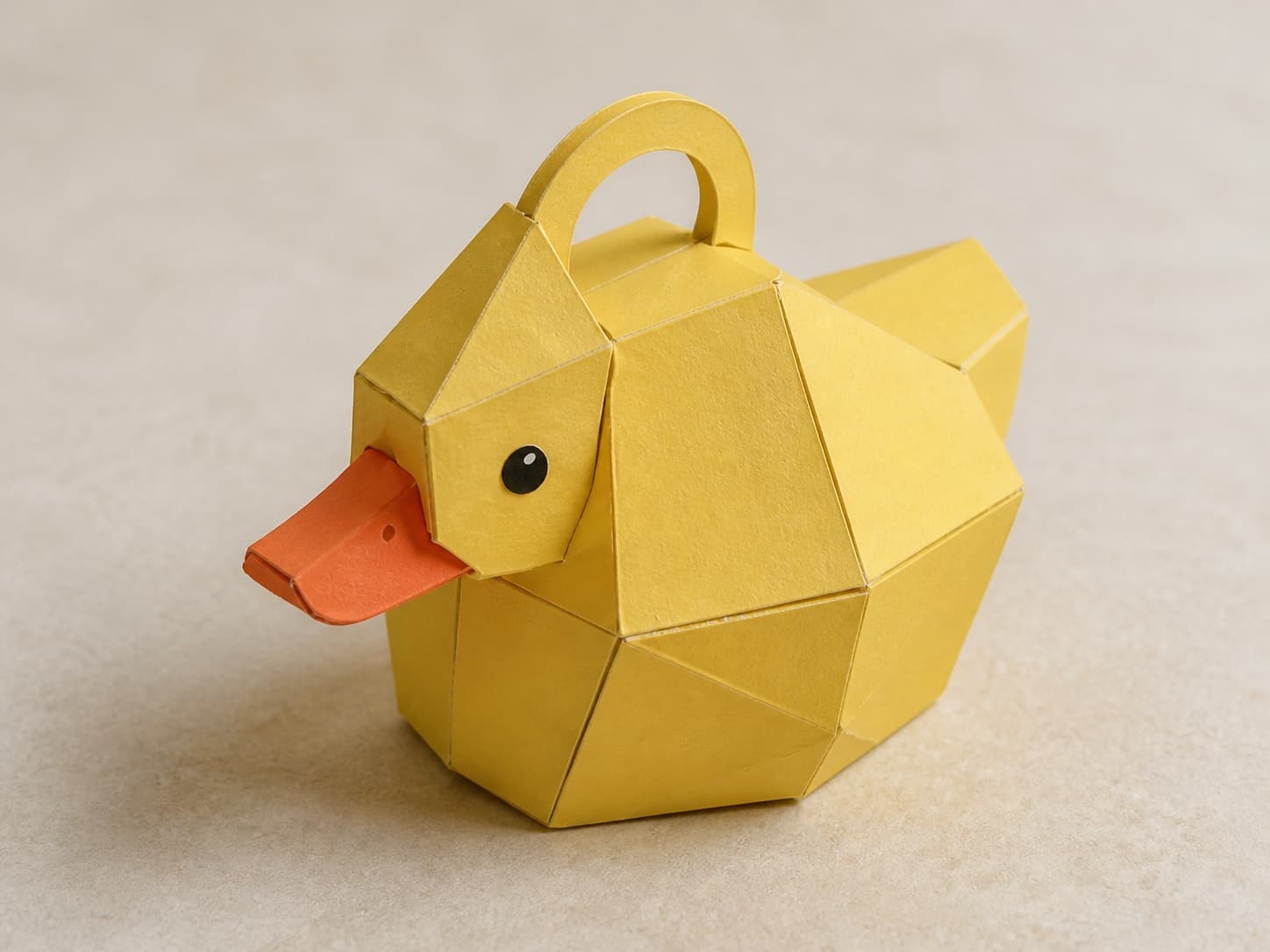 A yellow paper duck gift-box concept used as inspiration for a static crease-pattern prompt